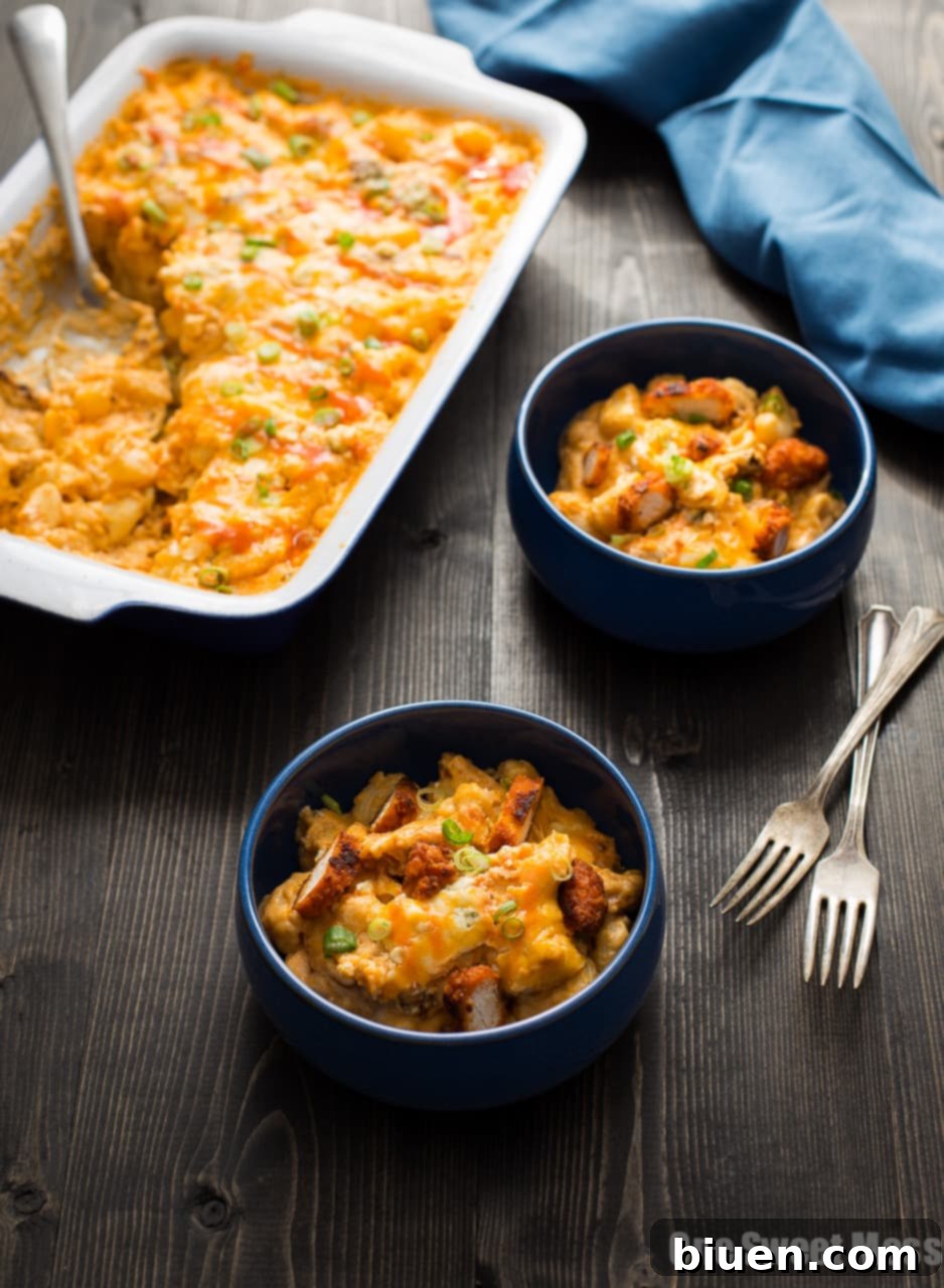 Creamy Buffalo Chicken Mac and Cheese ready for serving at a game day party