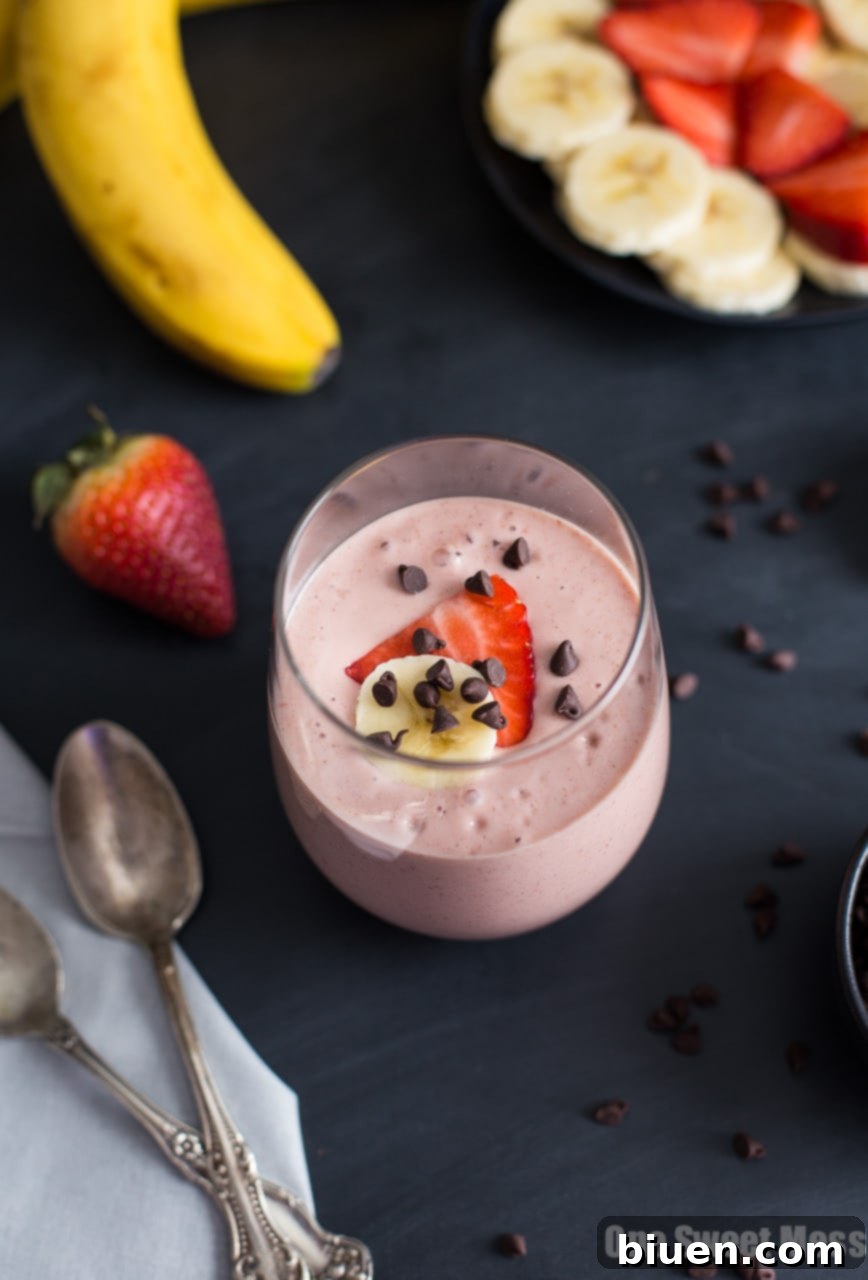 Blender full of Strawberry Banana Blender Pudding ingredients