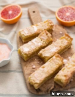 Blood Orange Jewel Bites, Vanilla Cloud Kiss 6 Final plated Blood Orange Bar, showing its delicious texture and glaze