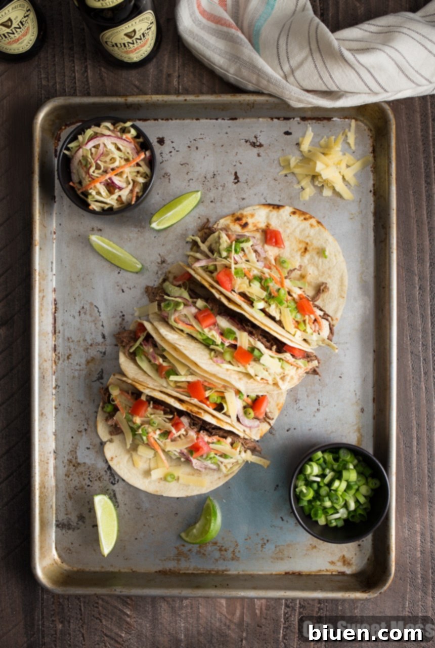Guinness Shredded Beef Tacos with Mustard Slaw