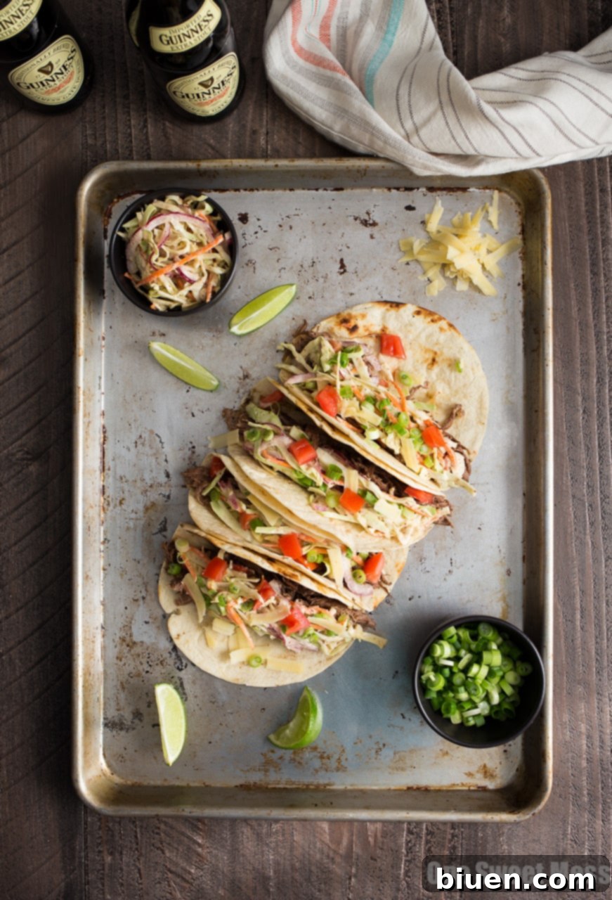 Guinness Shredded Beef Tacos with Mustard Slaw