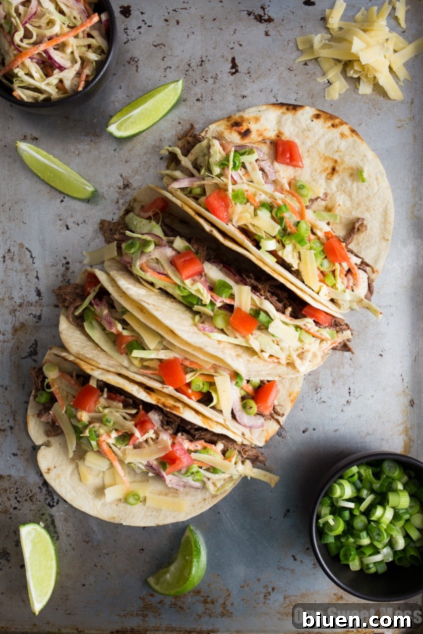 Guinness Shredded Beef Tacos with Mustard Slaw
