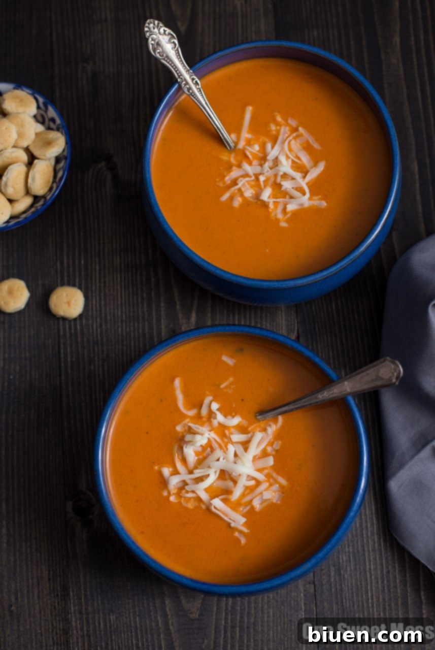 Roasted Red Pepper Smoked Gouda Soup served with crusty bread