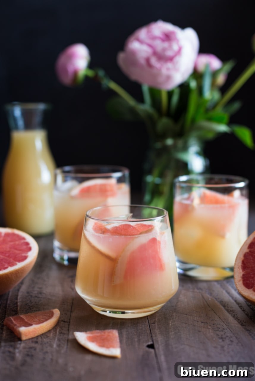 Elegant Bourbon Grapefruit Cocktail in a glass with a clear background