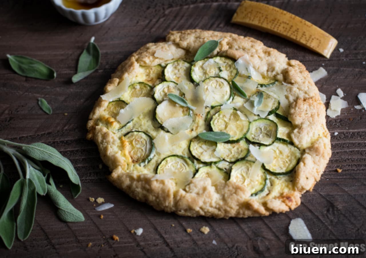 Close-up of a slice of Summer Squash & Ricotta Galette, revealing the creamy filling and tender squash layers