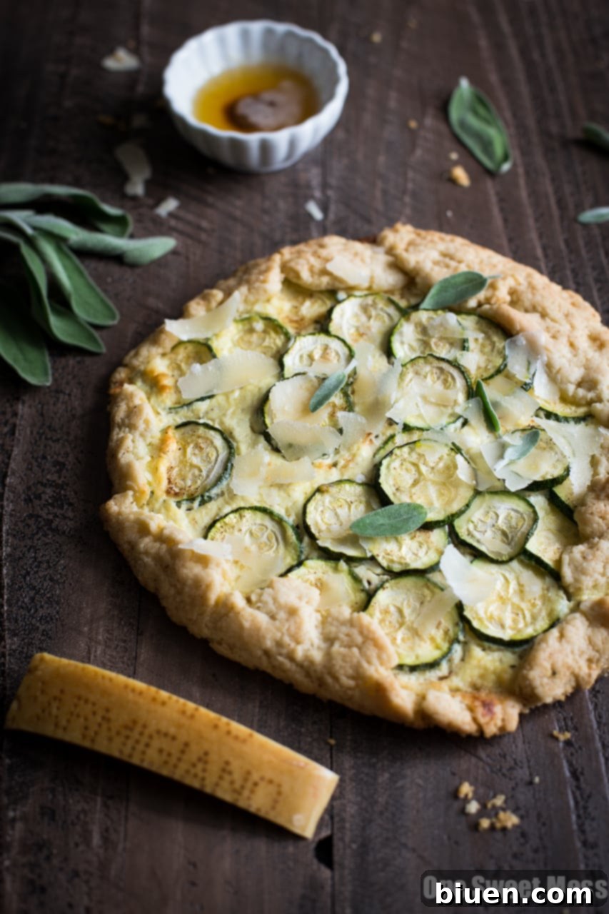 A freshly baked Summer Squash & Ricotta Galette, golden brown and ready to be served