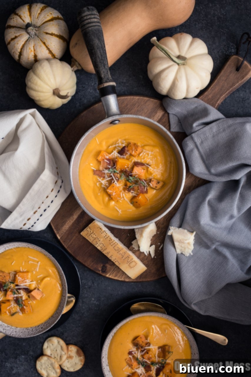 Velvety smooth Roasted Butternut Squash & Sweet Potato Soup ready for serving