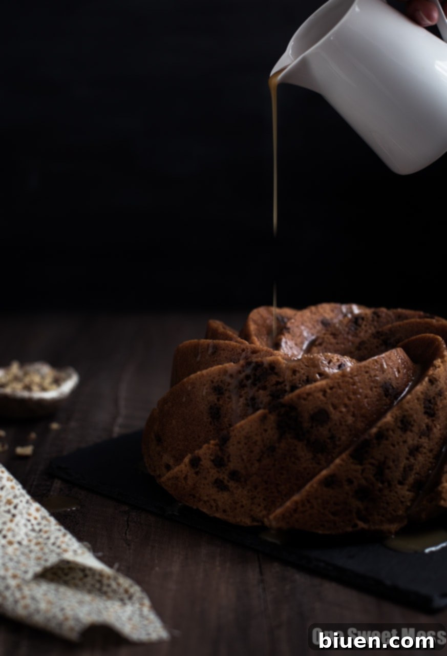 Cinnamon Brown Sugar Bundt Cake with Butterscotch Rum Glaze - A fully glazed Bundt cake