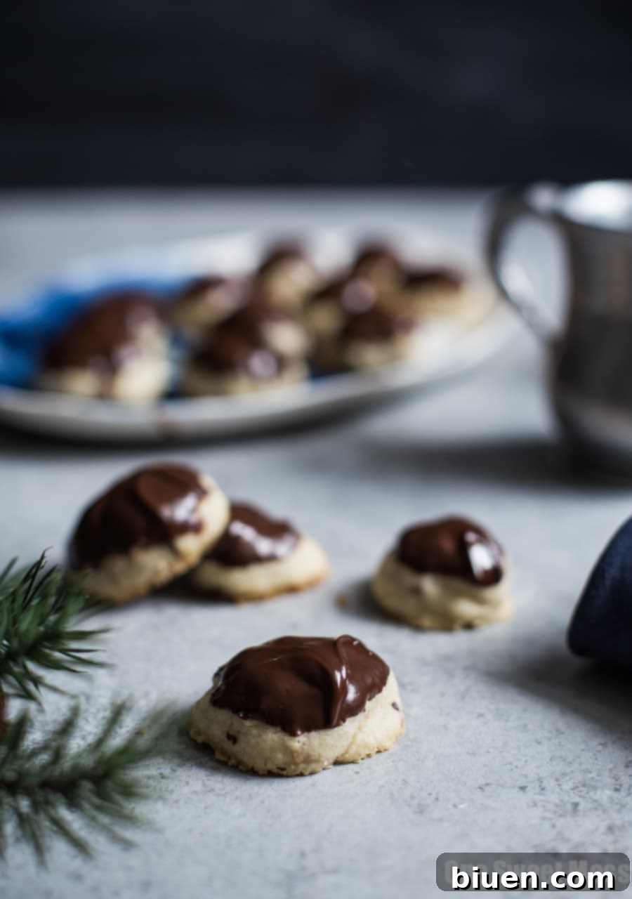 Friends enjoying cookies and cocktails during a crafting session