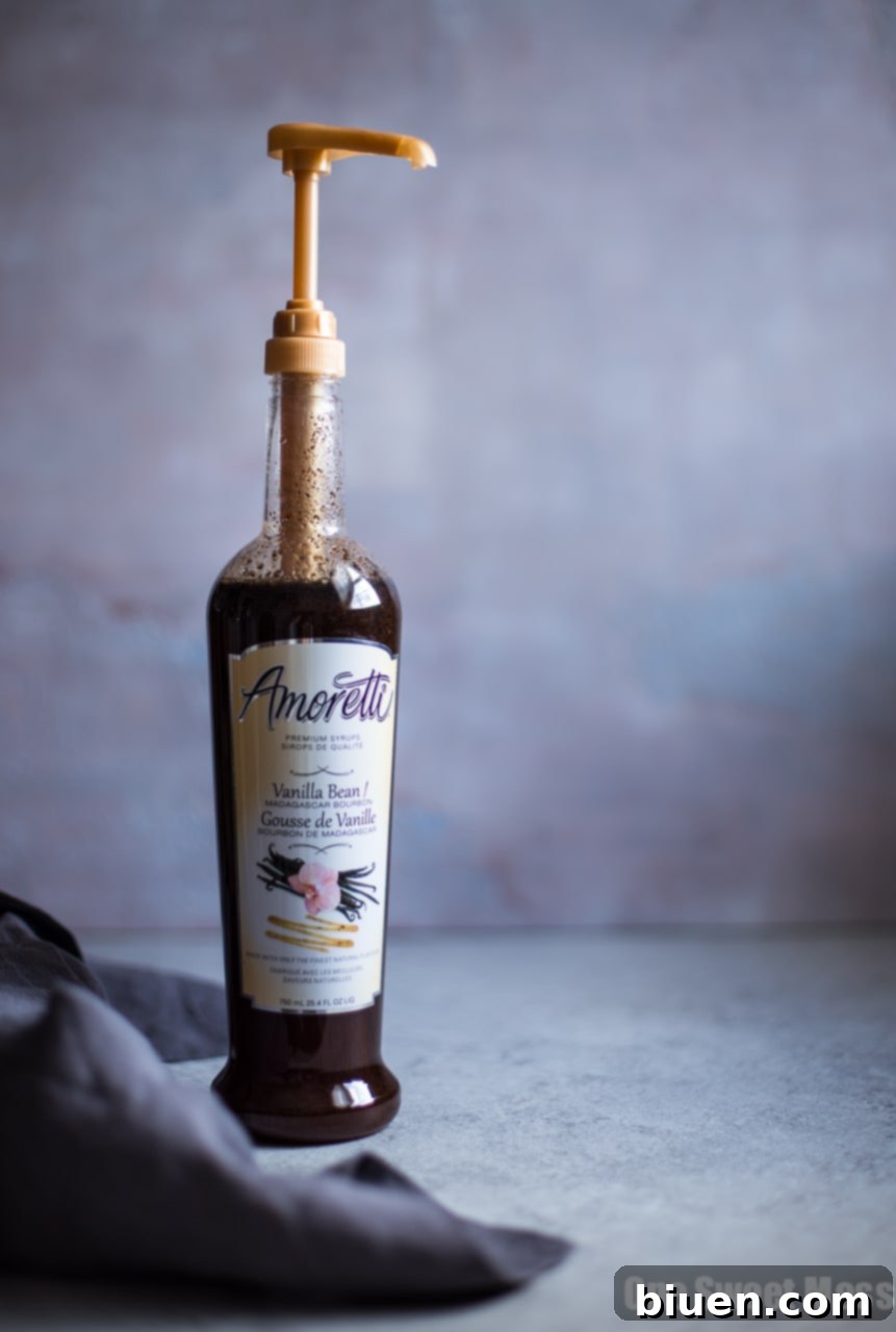 Bottle of Amoretti Madagascar Bourbon Vanilla Bean Syrup, a key ingredient