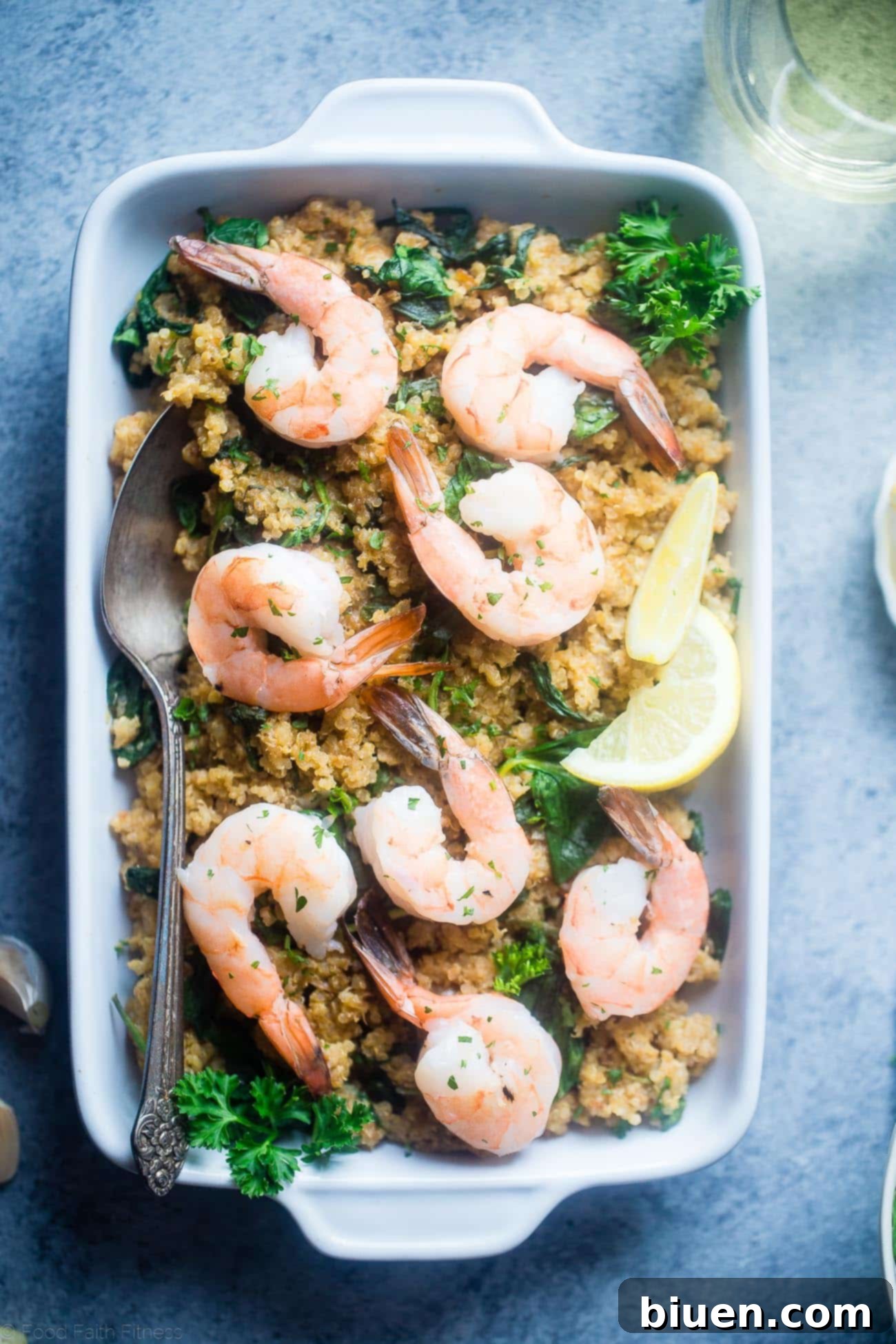 Delicious Slow Cooker Garlic Butter Shrimp and Quinoa, a healthy and convenient Tuesday dinner.