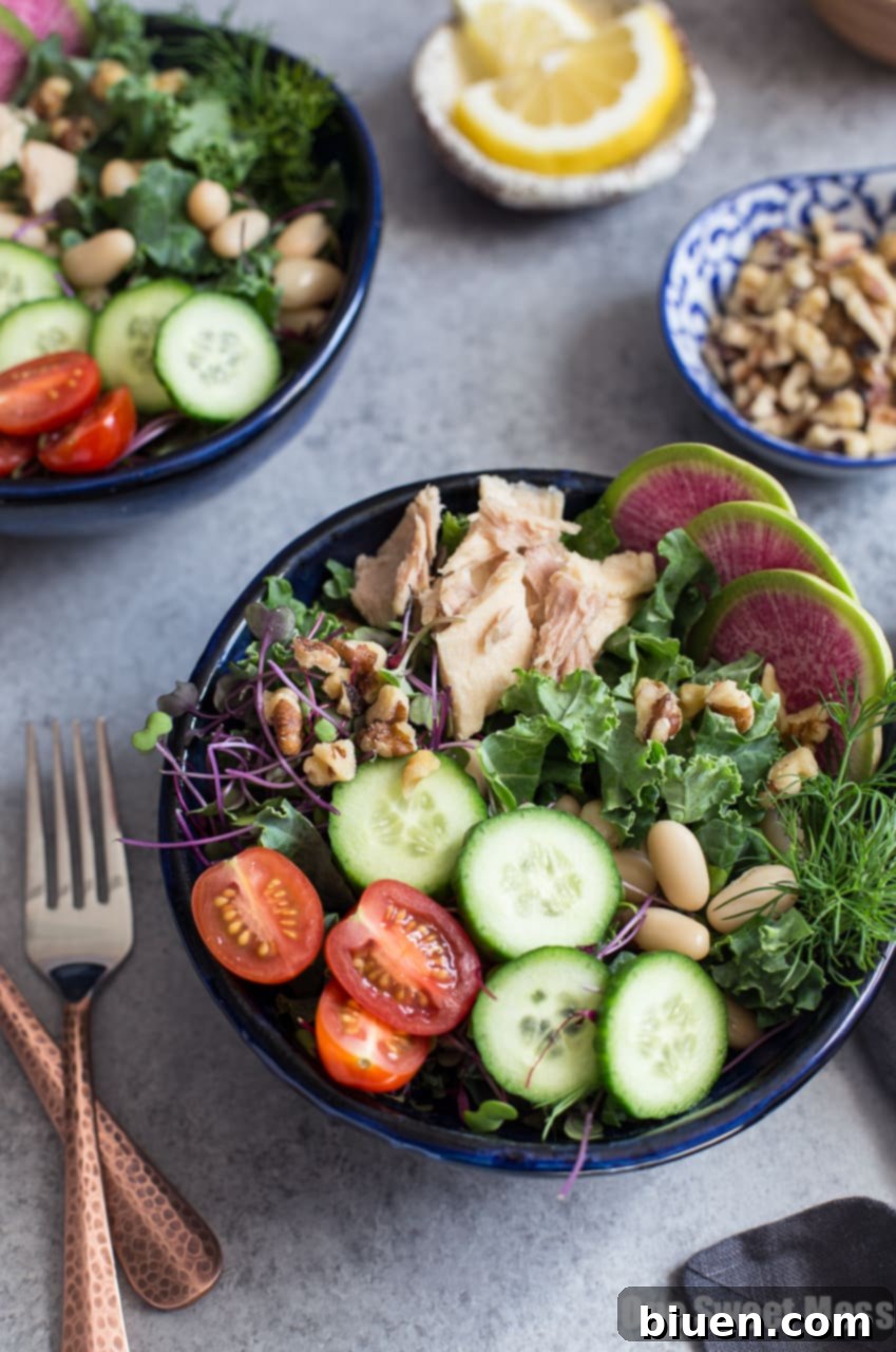 Close-up of Kale, White Bean, and Tuna Salad ingredients artfully arranged before tossing