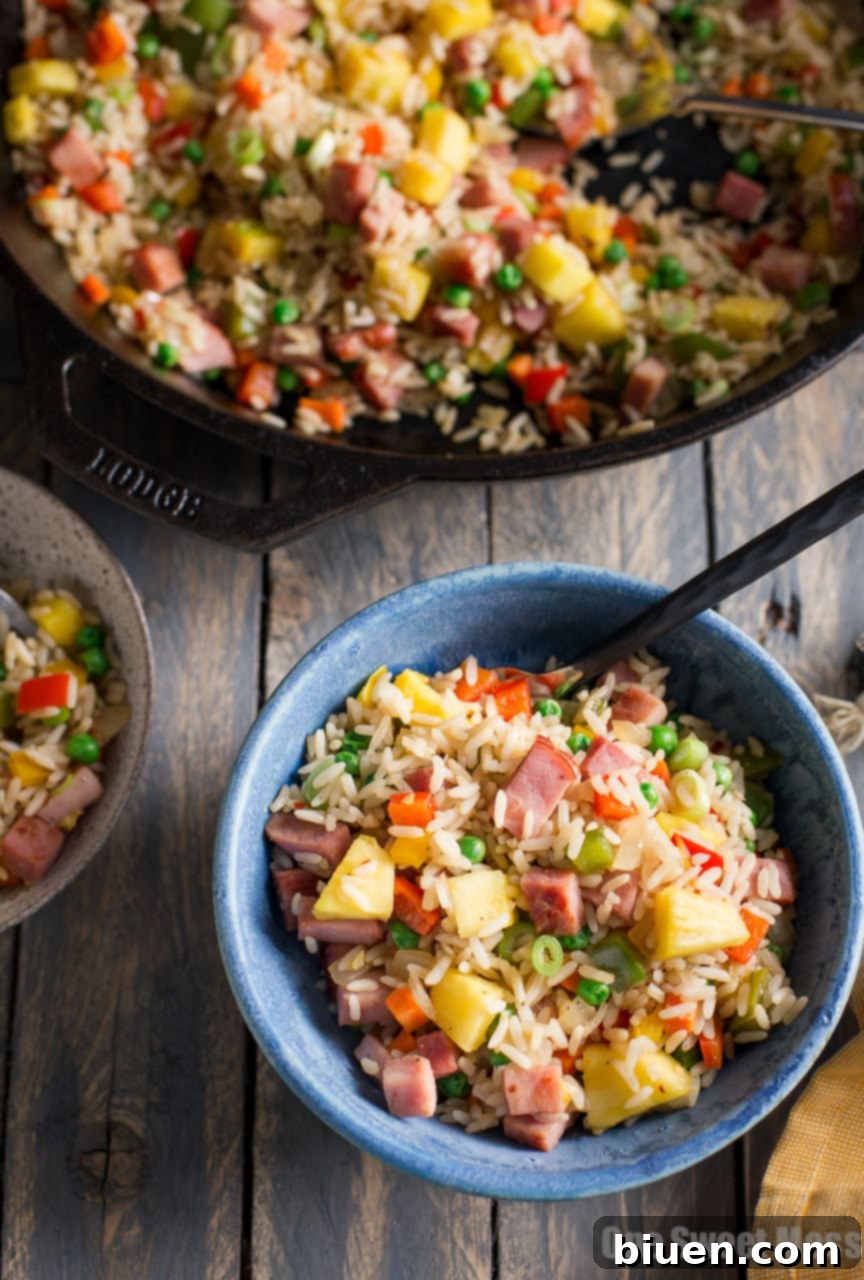 Close-up of Pineapple Ham Fried Rice ingredients, showing diced ham and vegetables