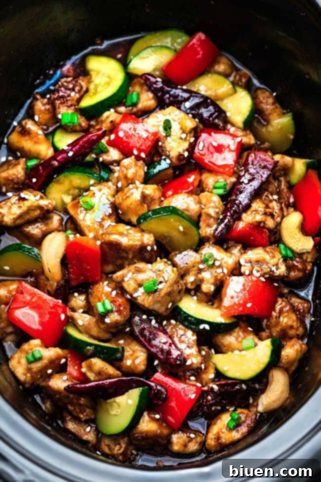 Delicious Slow Cooker Kung Pao Chicken with peanuts and vegetables