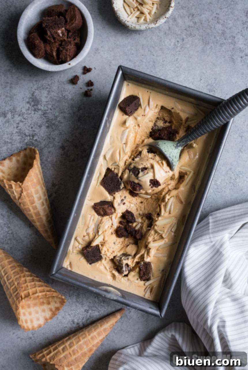 Decadent Salted Caramel Bourbon Fudge Brownie Ice Cream 2 Rich Salted Caramel Bourbon Fudge Brownie Ice Cream layered with chocolate and nuts