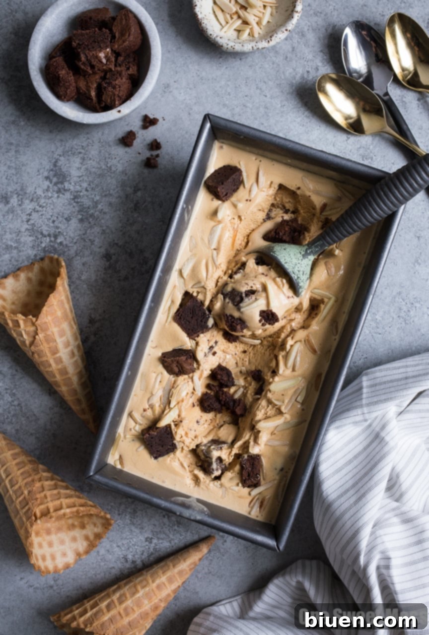 Decadent Salted Caramel Bourbon Fudge Brownie Ice Cream 6 Pouring the luscious salted caramel bourbon base into an ice cream maker