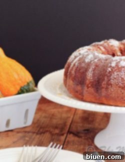 Maple Pecan Bundt Cake with a slice cut out