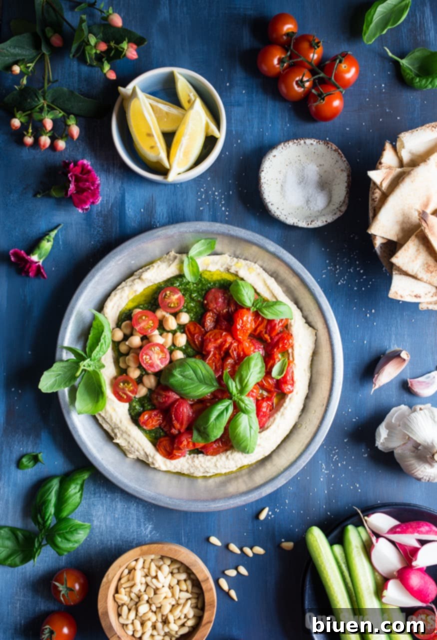 Sun-Kissed Pesto Hummus with Burst Tomatoes 2 Basil Pesto Hummus with Roasted Cherry Tomatoes