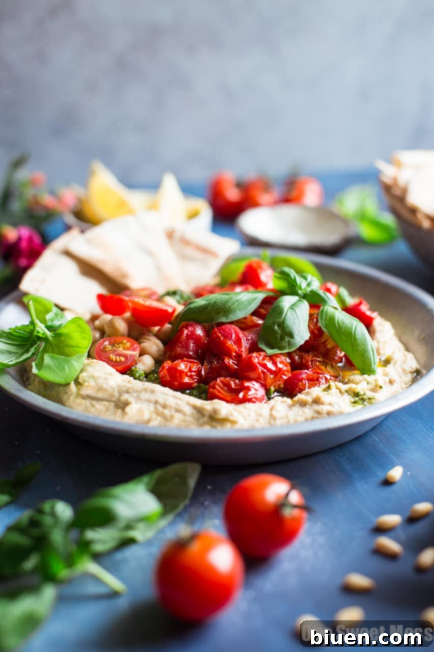Sun-Kissed Pesto Hummus with Burst Tomatoes 5 Basil Pesto Hummus with Roasted Cherry Tomatoes