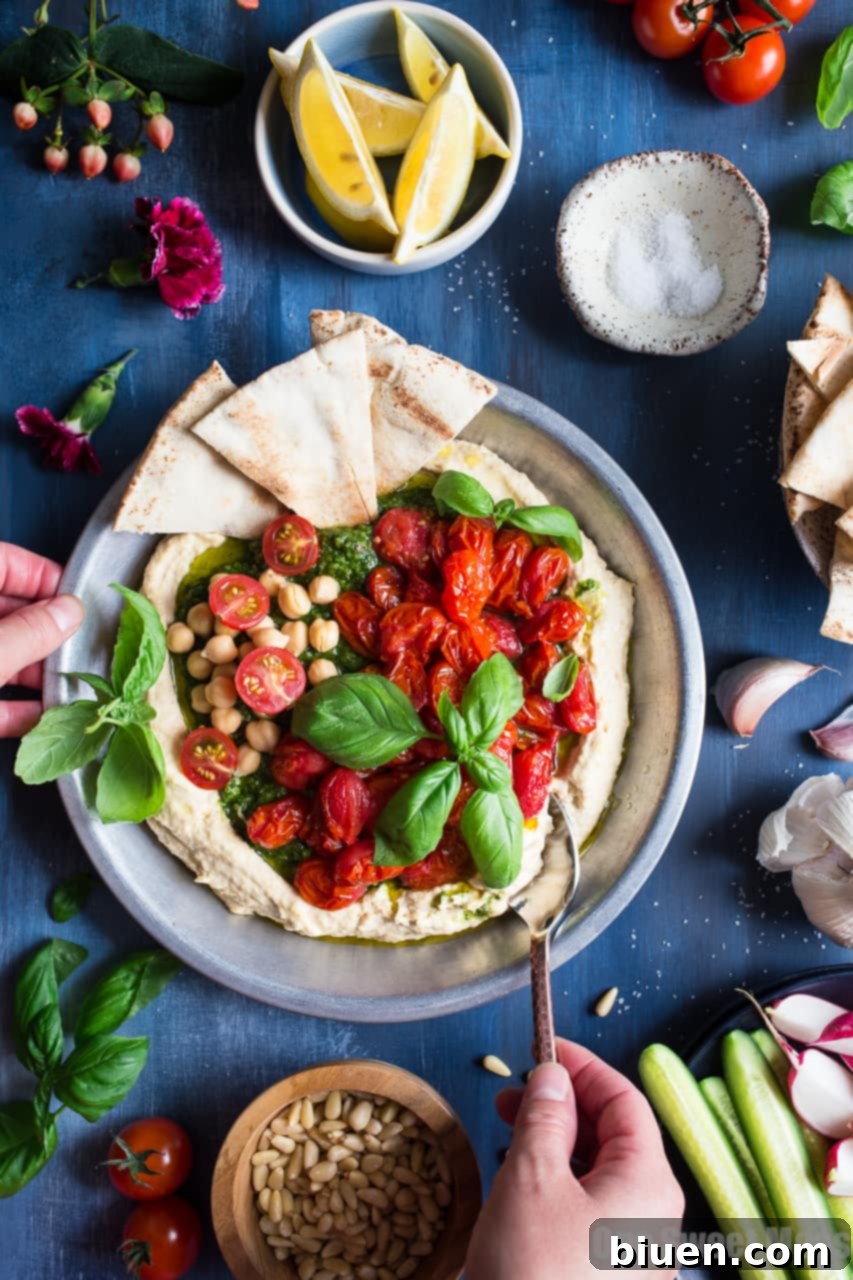 Sun-Kissed Pesto Hummus with Burst Tomatoes 6 Basil Pesto Hummus with Roasted Cherry Tomatoes