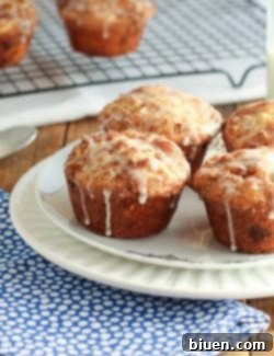 A perfectly baked Glazed Snickerdoodle Muffin.