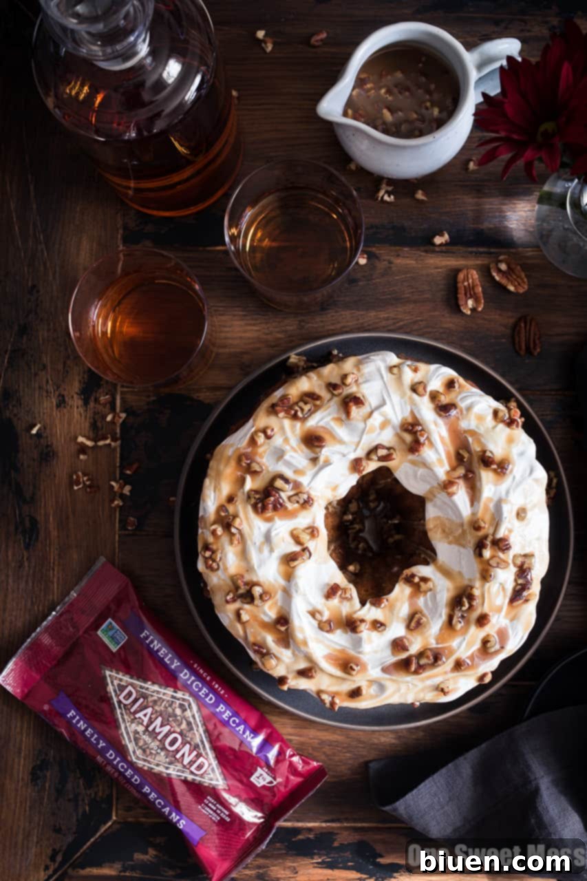 Sweet Potato Bundt Cake with Marshmallow Frosting and Bourbon Pecan Caramel Drizzle