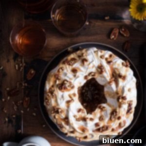 Fireside Sweet Potato Cloud Bundt 7 Sweet Potato Bundt Cake with Marshmallow Frosting and Bourbon Pecan Caramel Drizzle