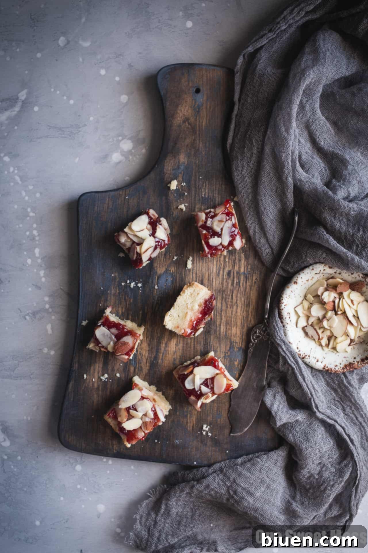 Buttery Gluten-Free Cherry Almond Shortbread Bars with a vibrant cherry topping