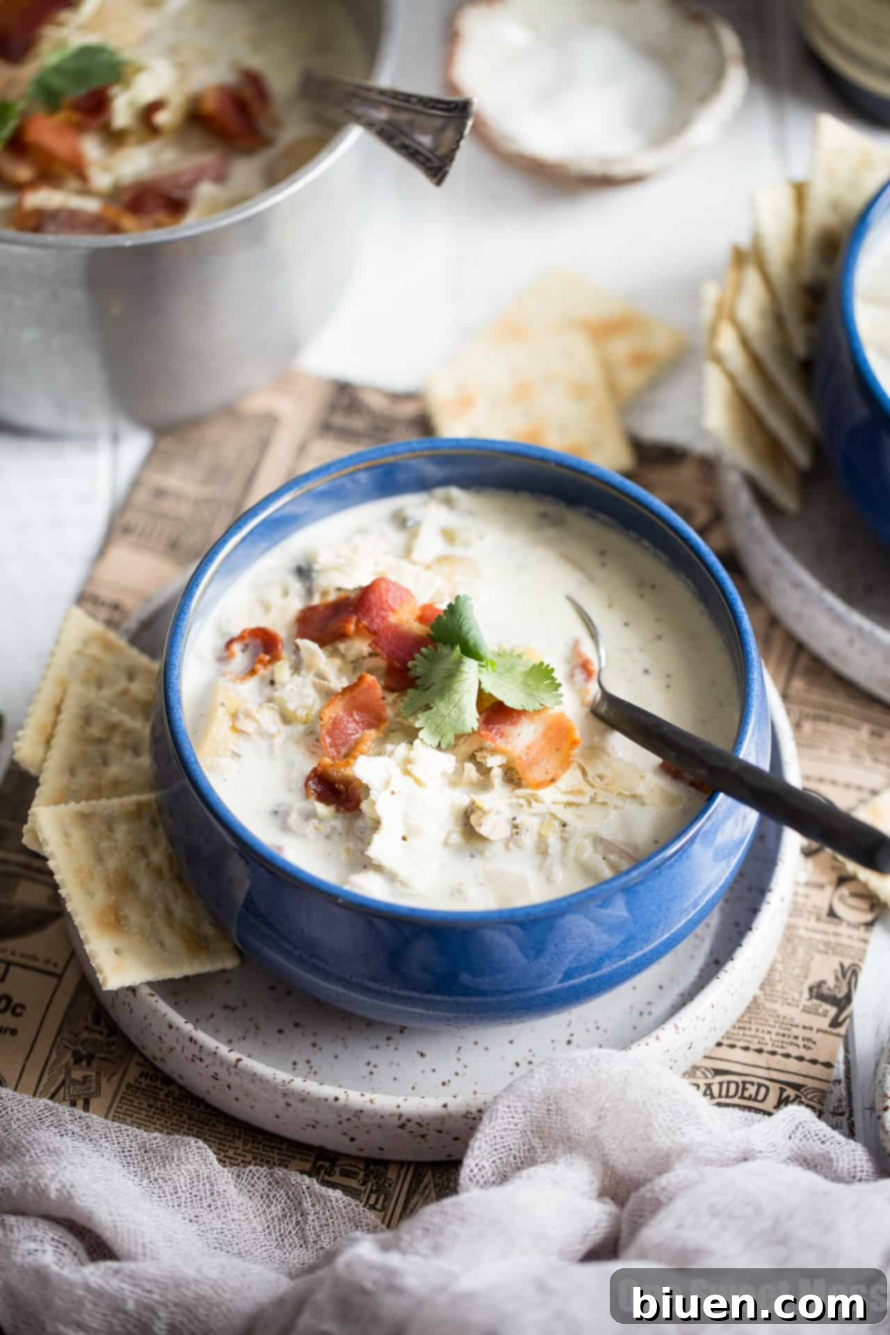 New England Clam Chowder: This gluten-free recipe results in a thick, hearty, and creamy chowder with crispy bacon.