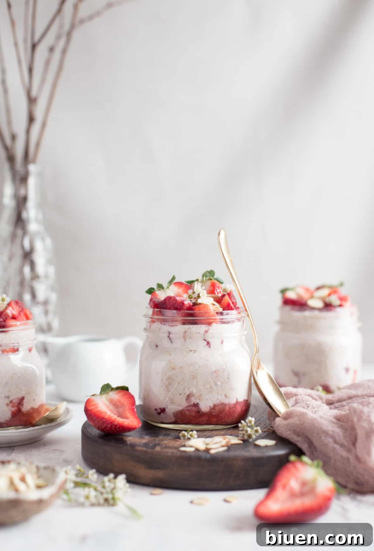 Variety of healthy toppings for Strawberries and Cream Overnight Oatmeal