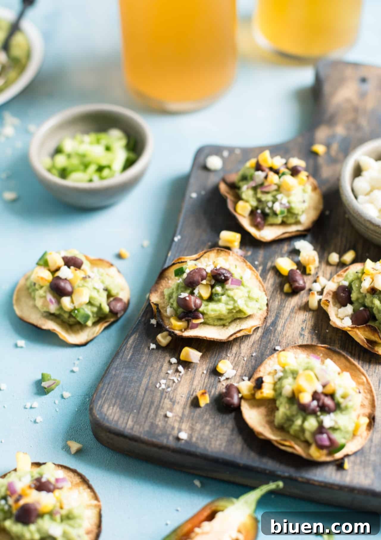 Grilled Corn Salsa & Guacamole Tostadas: This crispy bite-sized appetizer is perfect for football season. They're gluten-free and healthy with a vegan option. 