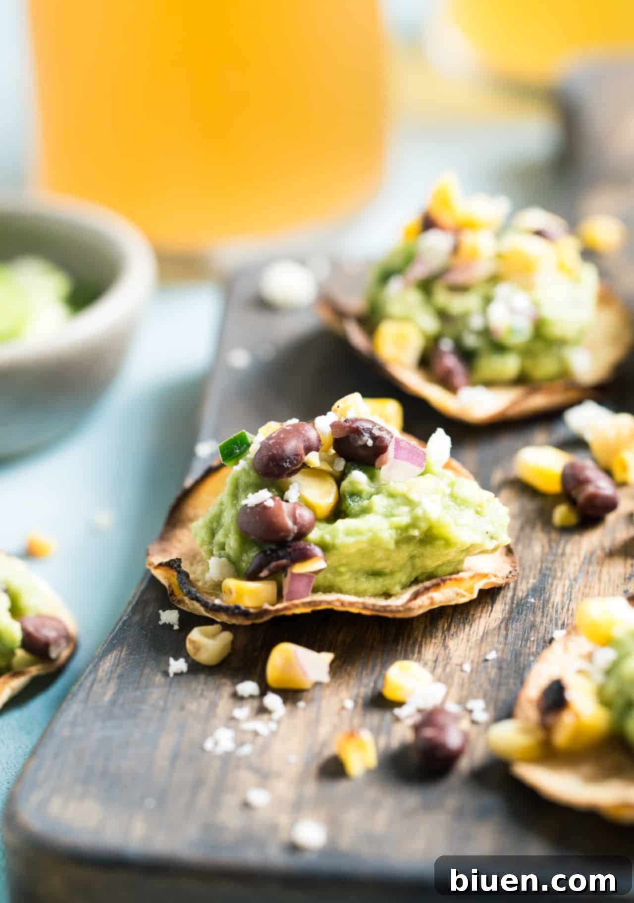 Grilled Corn Salsa & Guacamole Tostadas: This crispy bite-sized appetizer is perfect for football season. They're gluten-free and healthy with a vegan option. 