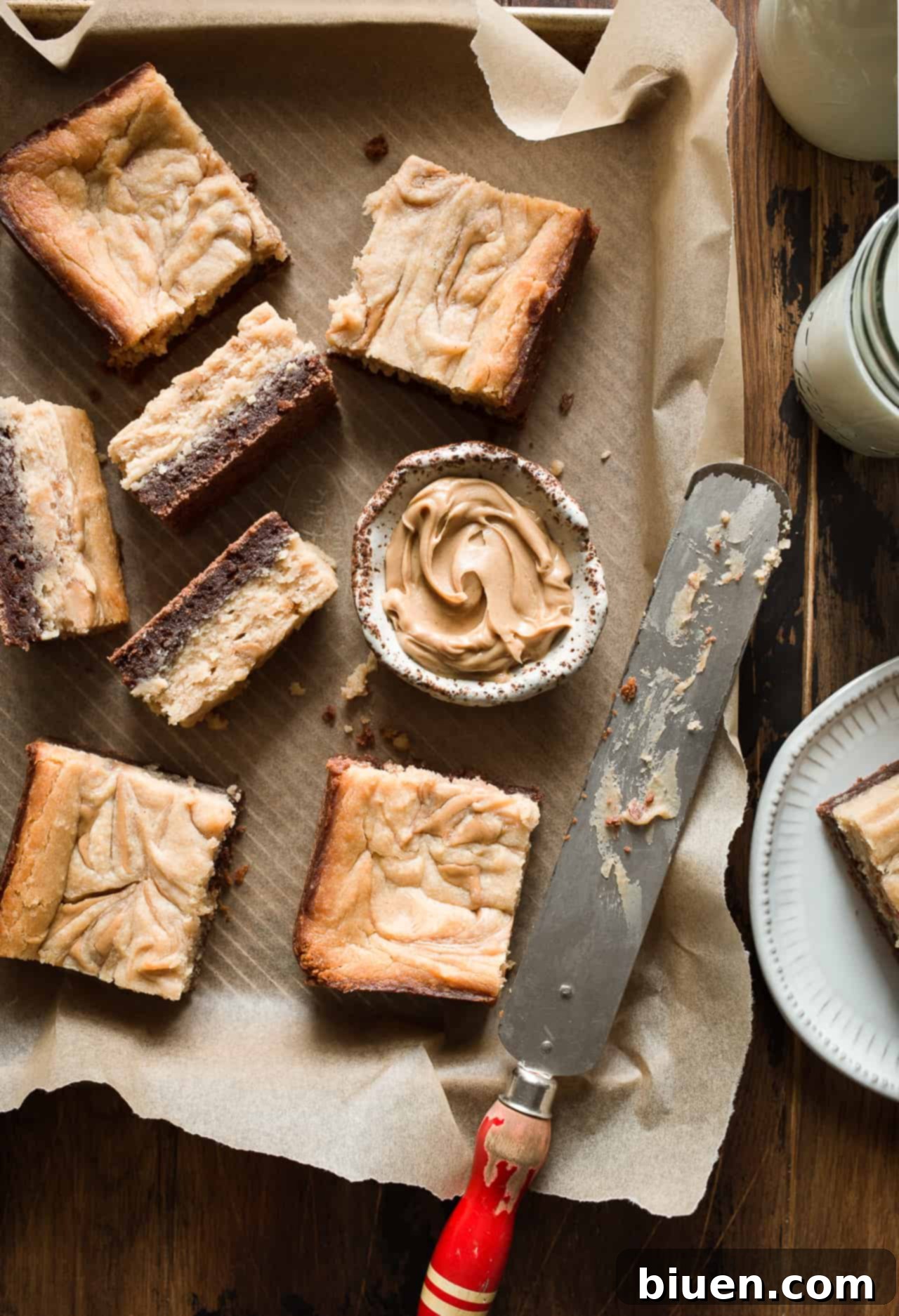 Rich Gluten-Free Peanut Butter Cheesecake Brownies with a creamy swirl
