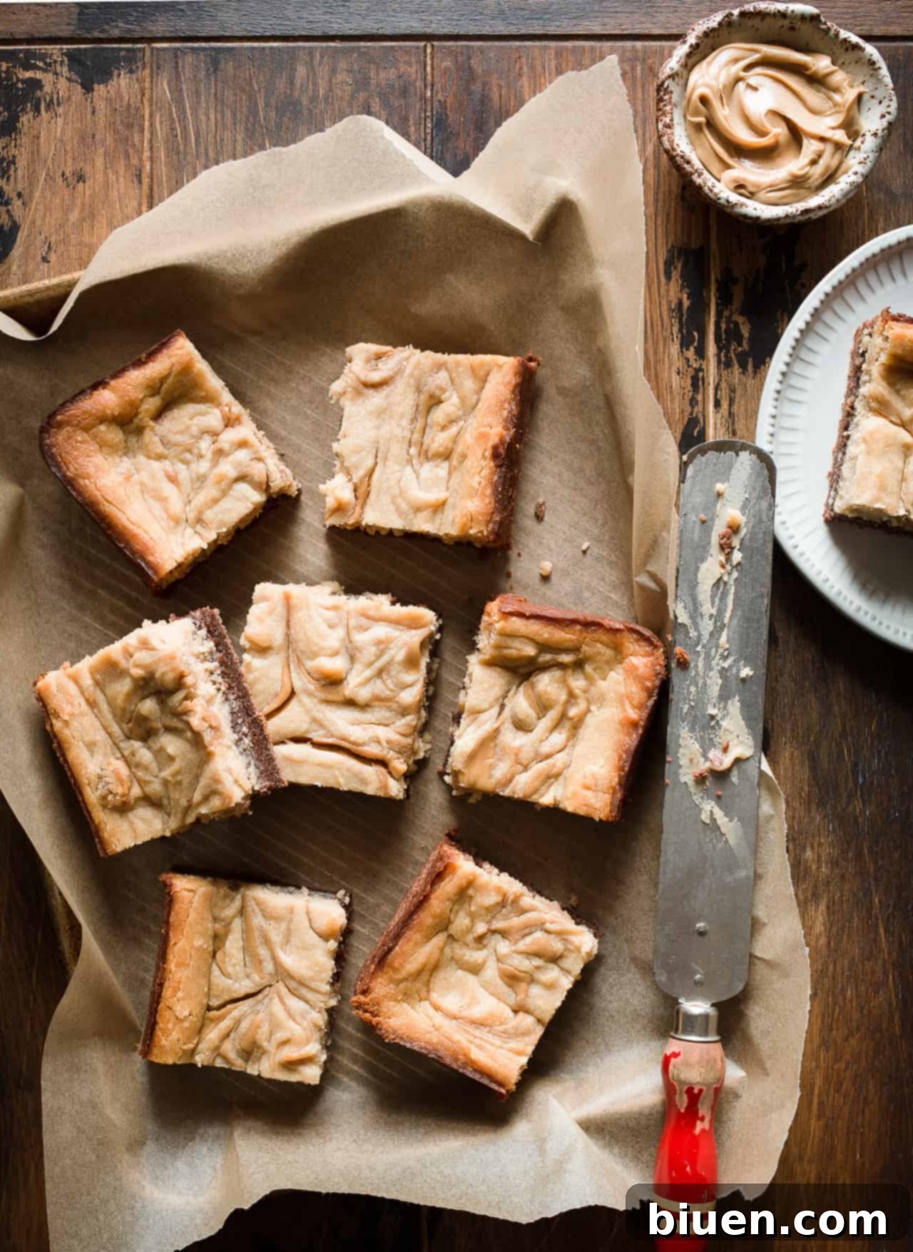 Slice of Gluten-Free Peanut Butter Cheesecake Brownie showing the distinct layers