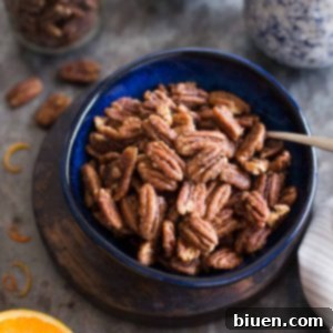 Maple-Orange Glazed Pecans 9 Maple-Orange Roasted Pecans | This naturally sweetened, gluten-free snack is bursting with the flavors of maple and orange.