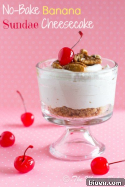 Lush layers of No-Bake Banana Sundae Cheesecake in a glass jar, ready to be served