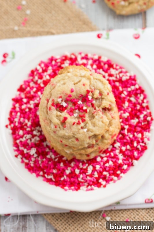 Stack of freshly baked Cream Cheese Funfetti Cookies, showing their inviting appearance.
