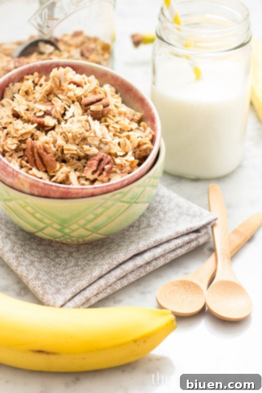 Granola clusters being poured into a bowl