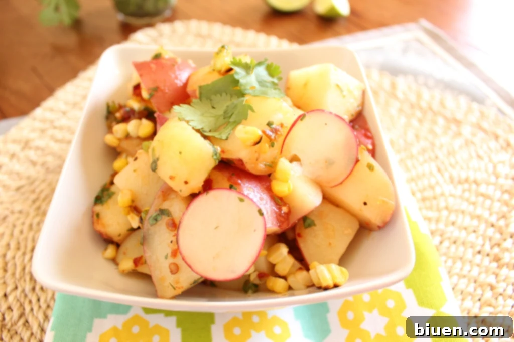 A beautifully presented Red Potato and Grilled Corn Salad, showcasing its vibrant colors and fresh ingredients