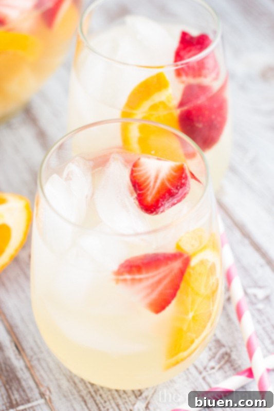 Fruity Pineapple Sangria | www.themessybakerblog.com