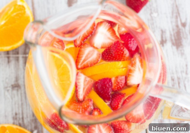 Fruity Pineapple Sangria | www.themessybakerblog.com