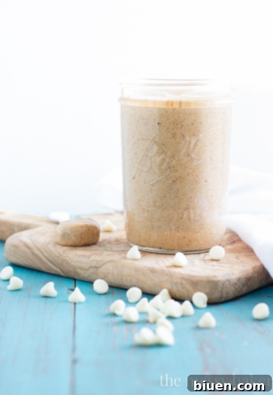 Fresh strawberries dipped in creamy white chocolate cinnamon almond butter, a perfect healthyish snack or dessert.