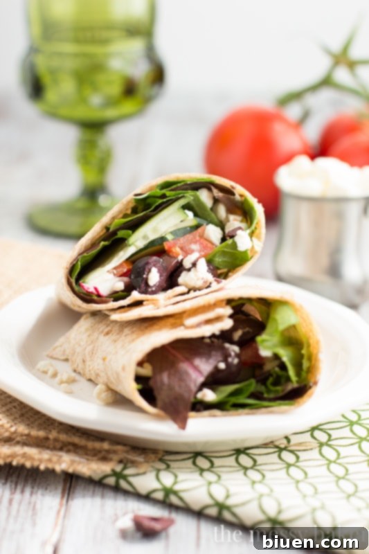 Vibrant Greek Wrap 3 Close-up of a delicious Greek Salad Wrap, perfect for a quick lunch
