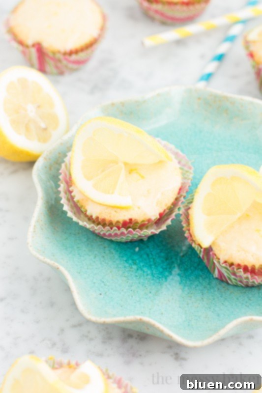Sunshine Lemon Cupcakes with Zesty Glaze 6 Lemon Cupcakes with Lemon Glaze | www.themessybakerblog.com