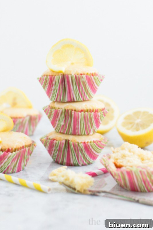 Sunshine Lemon Cupcakes with Zesty Glaze 7 Lemon Cupcakes with Lemon Glaze | www.themessybakerblog.com