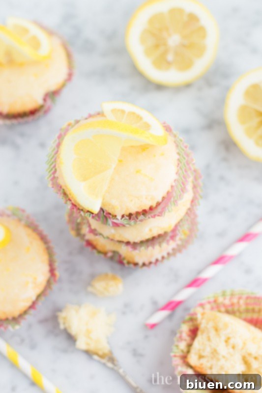 Sunshine Lemon Cupcakes with Zesty Glaze 8 Lemon Cupcakes with Lemon Glaze | www.themessybakerblog.com