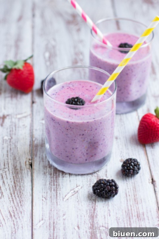 Close-up of fresh summer berries: strawberries, blueberries, raspberries, blackberries