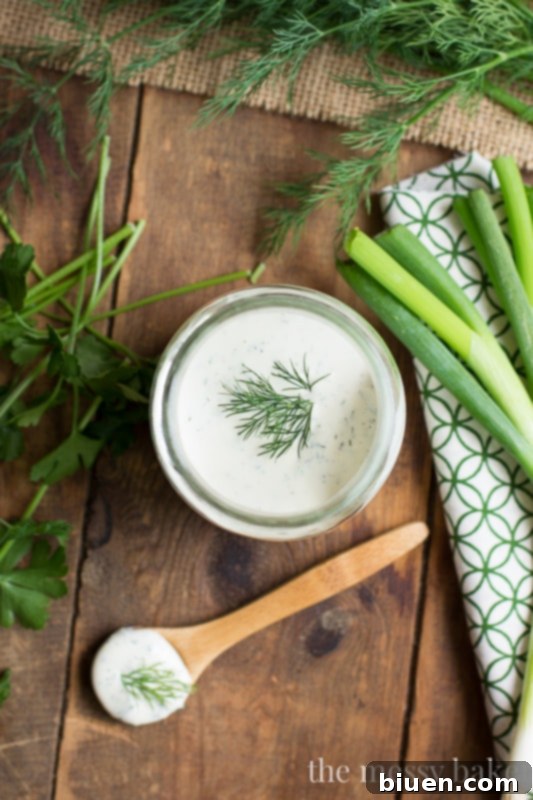 Mixing Homemade Buttermilk Ranch Dressing in a Bowl