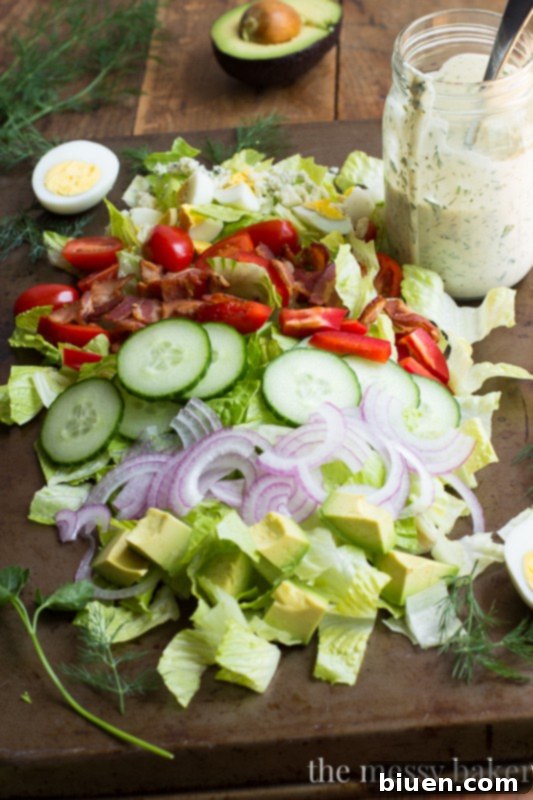 Garden Fresh Cobb Salad 4 Close-up of freshly picked grape tomatoes and green vegetables, perfect for a garden-fresh Cobb salad