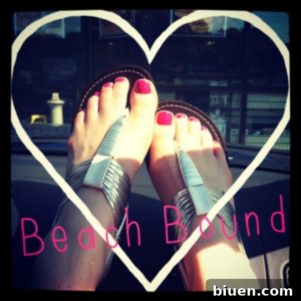 A serene beach scene with calm ocean waves and clear skies, symbolizing ultimate relaxation and summer escape.